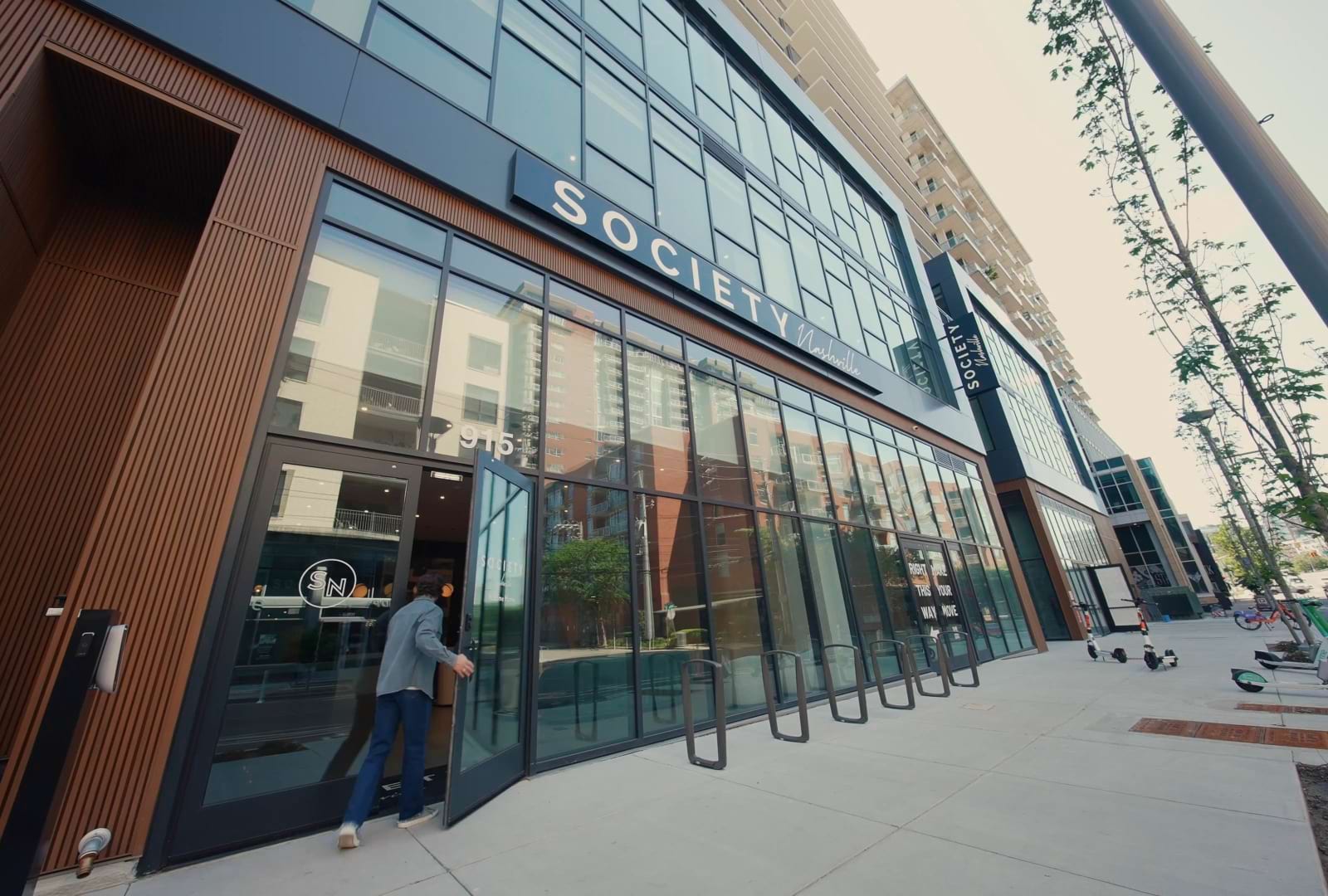 a person walking into a building 